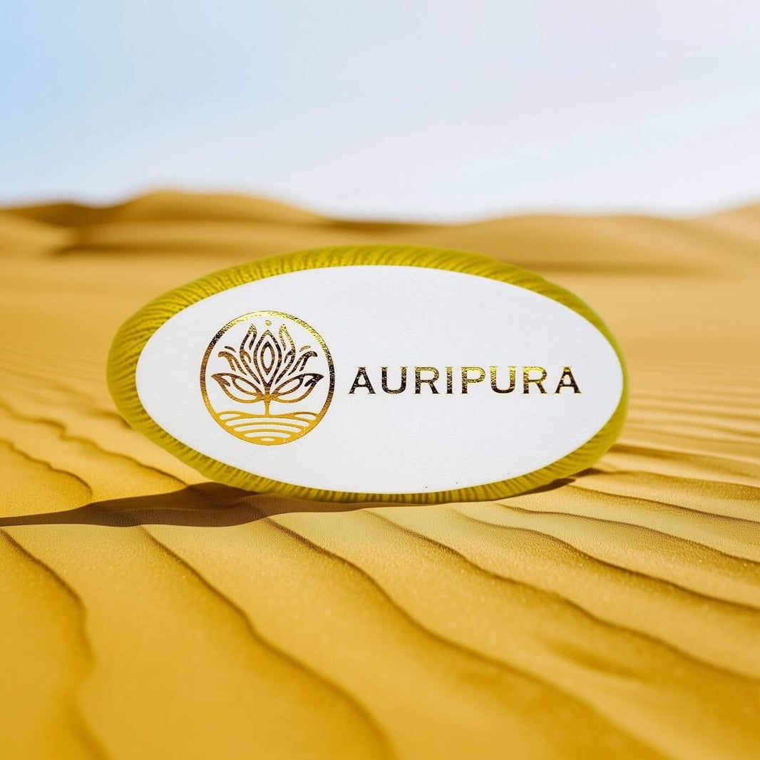 Gelber Chakra-Streifen und edles Auripura-Logo an der Matratzenkante